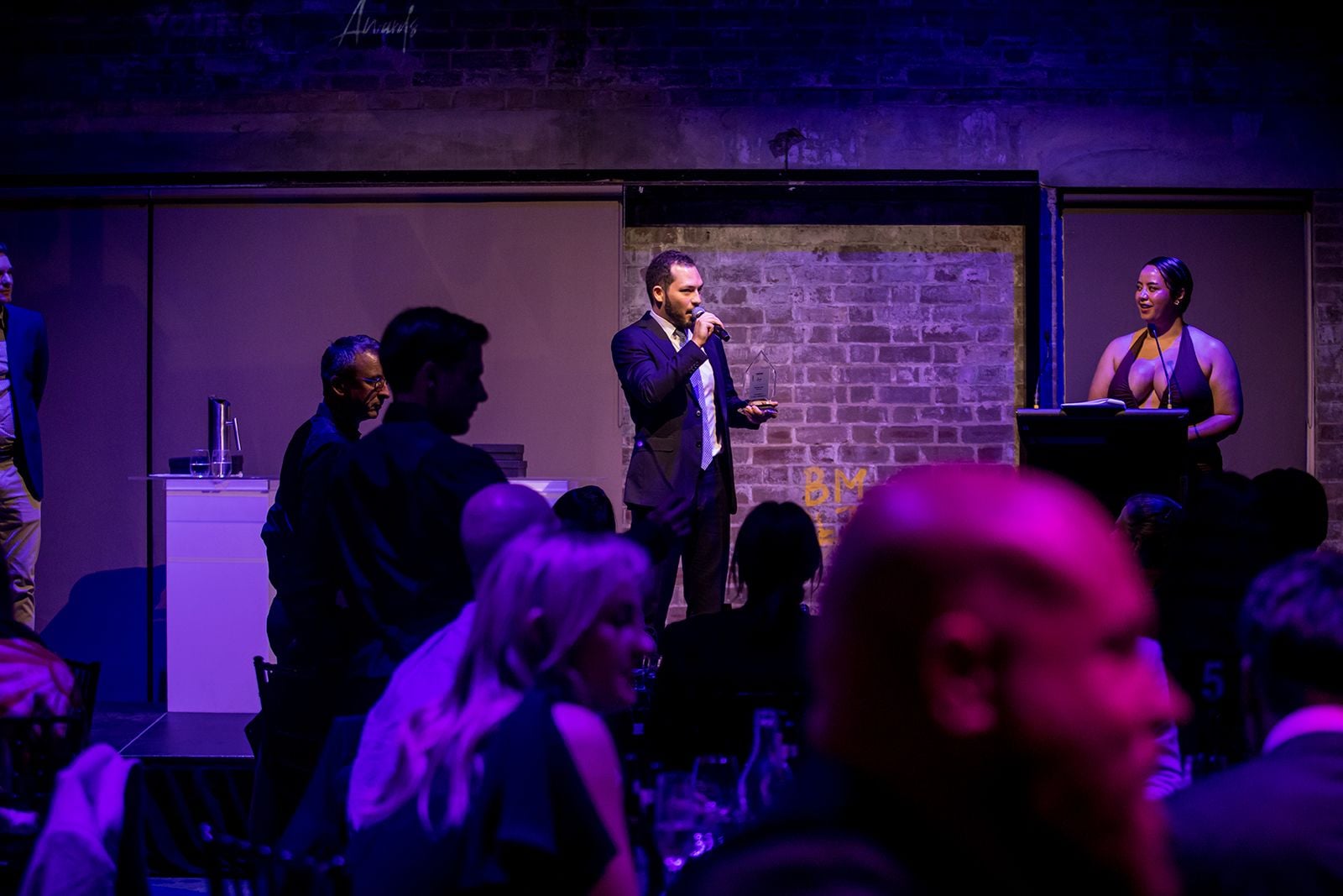 2025 Sydney Young Entrepreneur Awards Gala dinner Winners accepting trophies on stage at the 2025 Sydney Young Entrepreneur Awards
